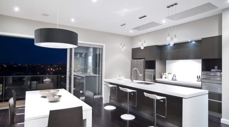 View of the kitchen and dining area of countertop, interior design, kitchen, real estate, room, white, black