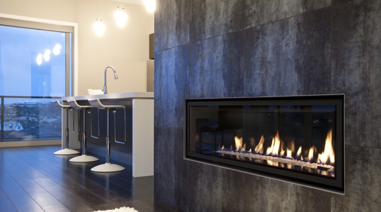 interior view of the New David Reid show fireplace, hearth, interior design, wood burning stove, black