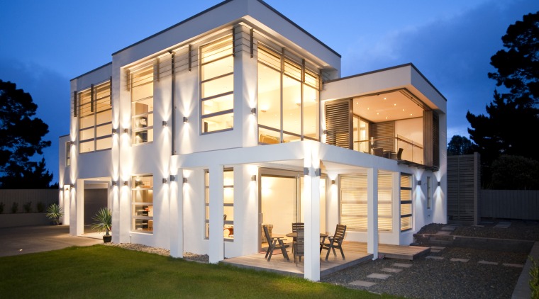 Exterior view of a new home in albany.PTG building, elevation, estate, facade, home, house, lighting, property, real estate, residential area, siding, villa, window