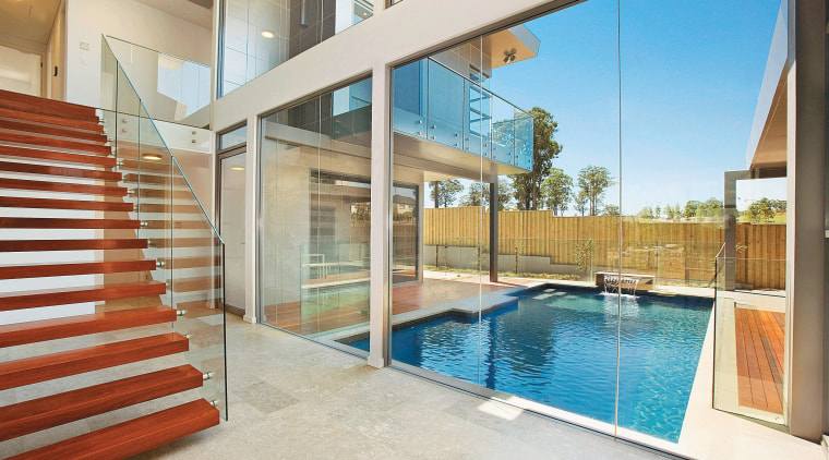 View of home designed by Aspect Design and apartment, estate, home, house, interior design, property, real estate, swimming pool, window, white