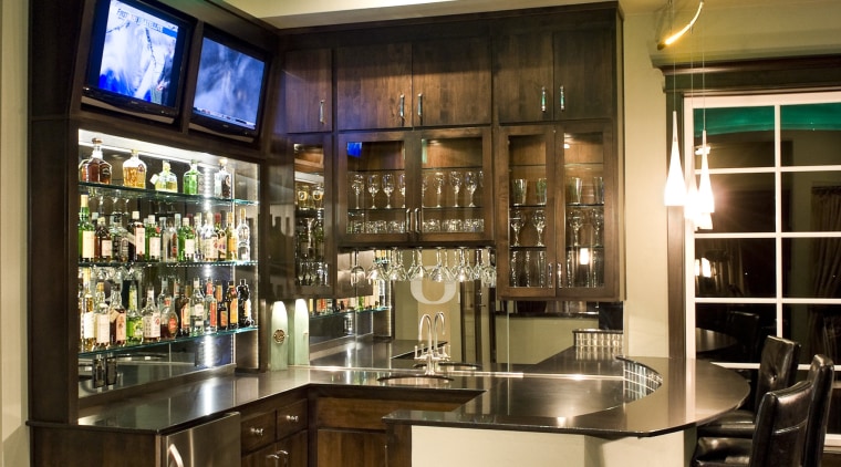 Director Dan Cooper of DC Fine Homes and bar, countertop, interior design, kitchen, restaurant, brown