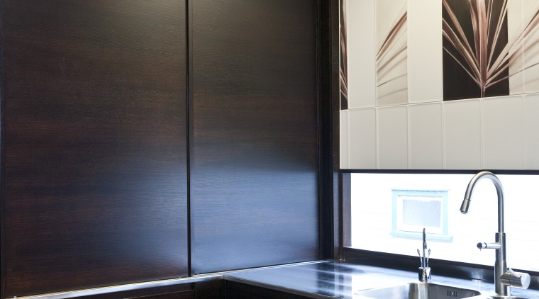 So this area looks good even when the bathroom, ceiling, countertop, floor, flooring, glass, interior design, room, sink, black, gray