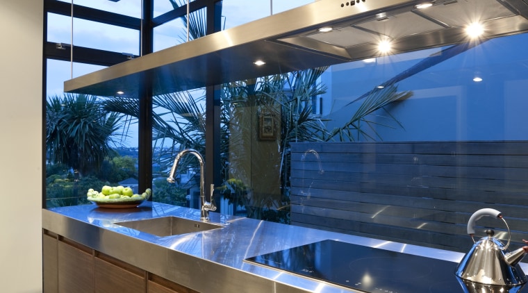 View of kitchen featuring american walnut base cabinets, countertop, interior design, kitchen, brown