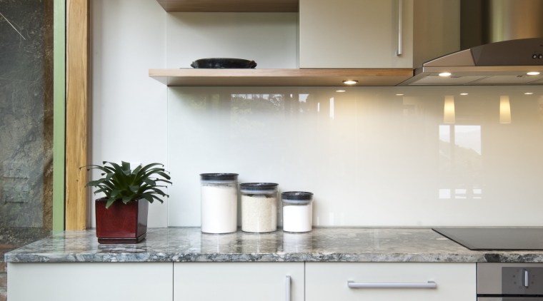 A new layout ensures views take priority.Mood lighting cabinetry, countertop, cuisine classique, hardwood, interior design, kitchen, room, gray, brown