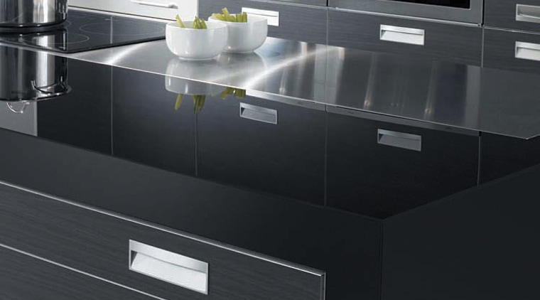 With a fully integrated kitchen design, appliances are countertop, floor, furniture, home appliance, kitchen, kitchen appliance, kitchen stove, product, product design, black