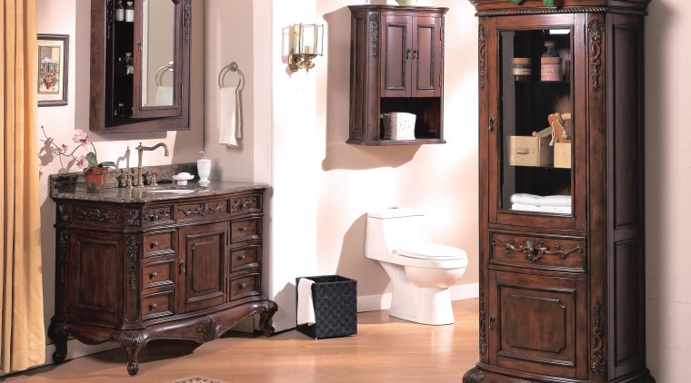 View of a traditional-styled bathroom which features bathroom bathroom accessory, bathroom cabinet, cabinetry, chest of drawers, china cabinet, display case, drawer, furniture, hardwood, shelving, white