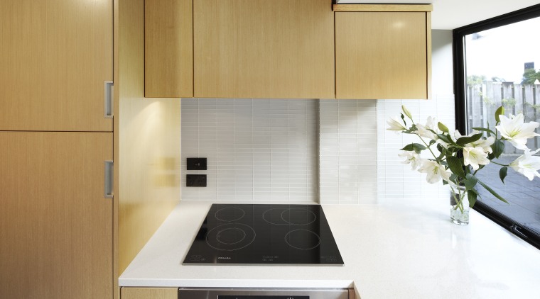 View of a kitchen designed by Ingrid Geldof cabinetry, countertop, cuisine classique, interior design, kitchen, white