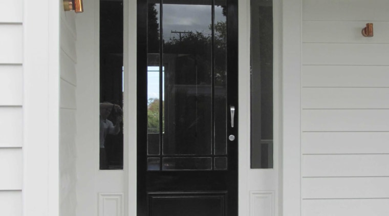 View of a renovated two-storey villa which features door, home, window, gray, white