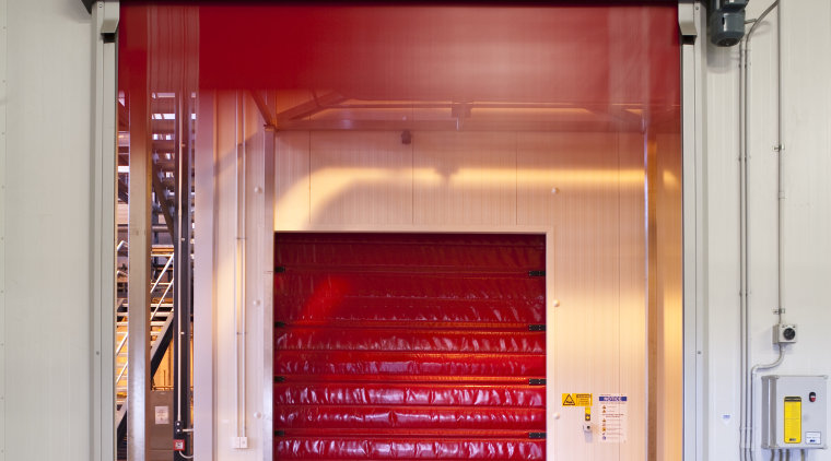 View of the Lion Nathan storage warehouse which door, gray