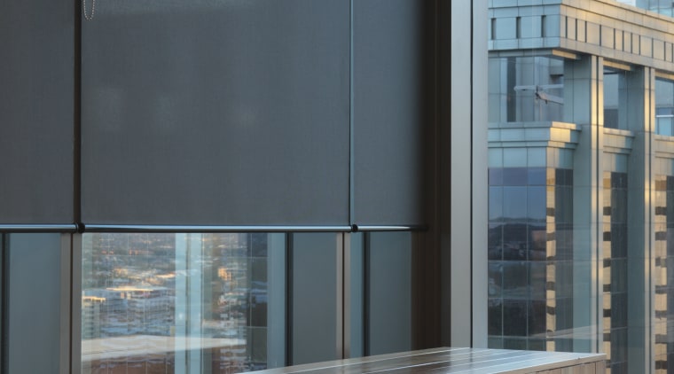 Interior view of 34-Story building with blinds from apartment, architecture, building, furniture, glass, interior design, table, window, teal, black