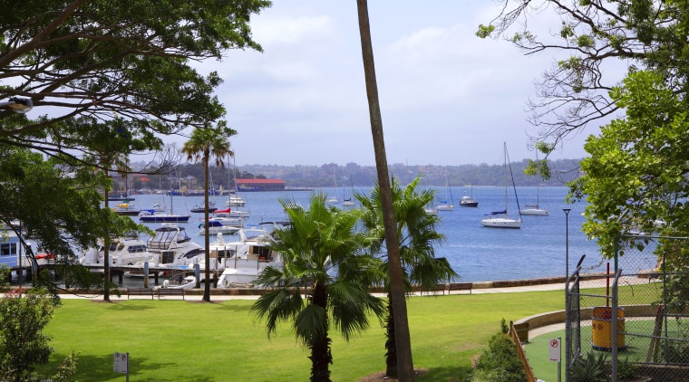 View of Elizabeth Bay from the covered patio. arecales, lake, leisure, palm tree, plant, real estate, recreation, resort, sky, tree, water, teal