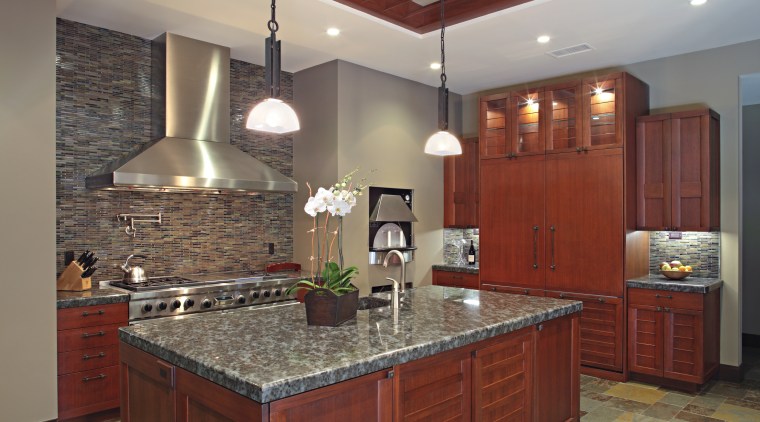 View of the cabinetry within this modern kitchen. cabinetry, ceiling, countertop, cuisine classique, flooring, home, interior design, kitchen, real estate, room, gray, red