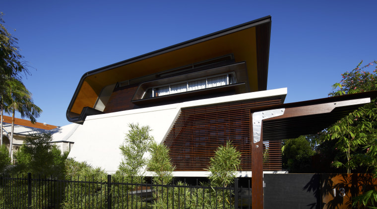 Exterior view of this contemporary home by Arkhefield architecture, facade, home, house, outdoor structure, real estate, residential area, roof, sky, blue, black