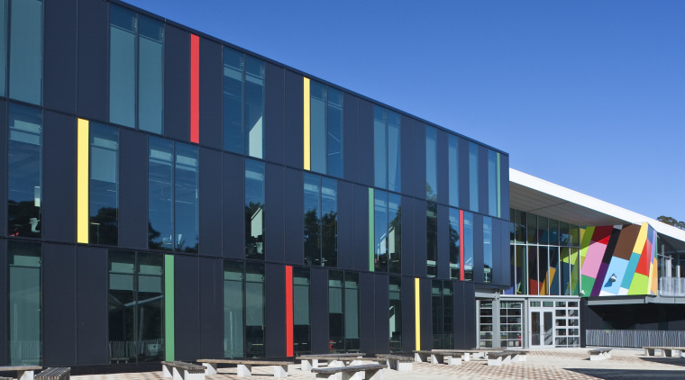 Exterior view of the Albany Senior High School architecture, building, commercial building, corporate headquarters, facade, mixed use, residential area, sky, structure, blue