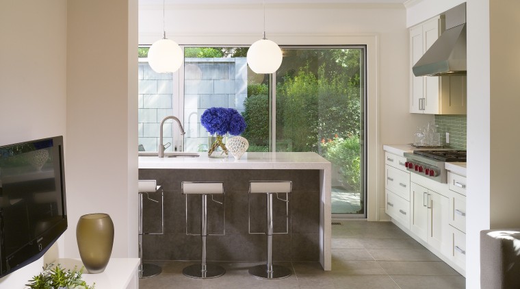 View of kitchen featuring island with CaesarStone countertops, architecture, ceiling, countertop, floor, home, house, interior design, kitchen, living room, real estate, room, table, gray