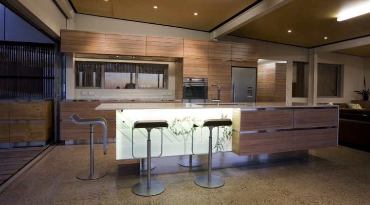 View of a kitchen which features an island architecture, cabinetry, ceiling, countertop, furniture, interior design, kitchen, wood, brown