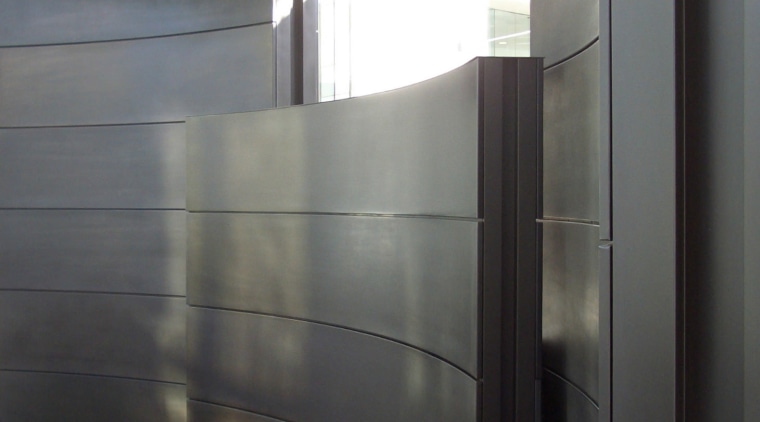 View of brass walls fabricated by Craft Metals architecture, daylighting, glass, gray, black