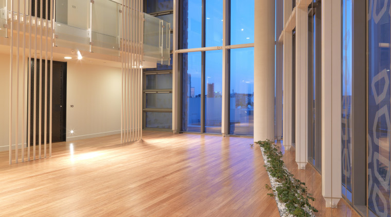 Interior view of the atrium of the Triptych apartment, architecture, estate, floor, flooring, hardwood, interior design, laminate flooring, lobby, real estate, wood, wood flooring, orange
