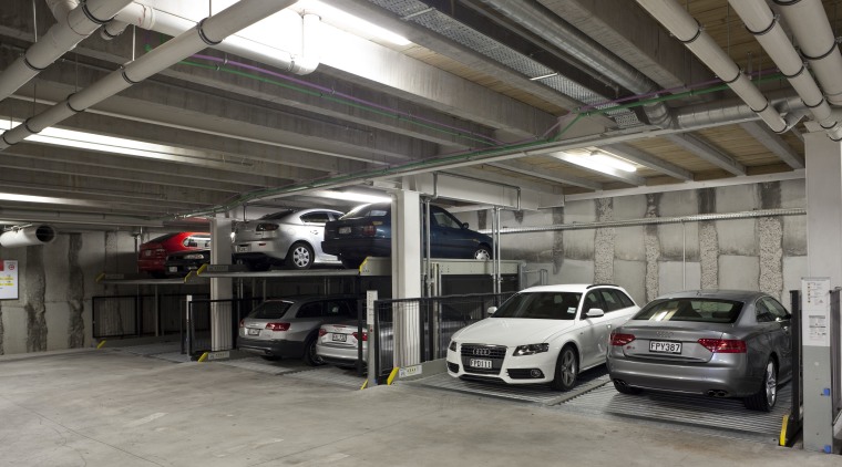 View of the underground car parking at the audi, automobile repair shop, automotive design, automotive exterior, building, car, executive car, family car, garage, luxury vehicle, motor vehicle, parking, parking lot, personal luxury car, vehicle, gray, black