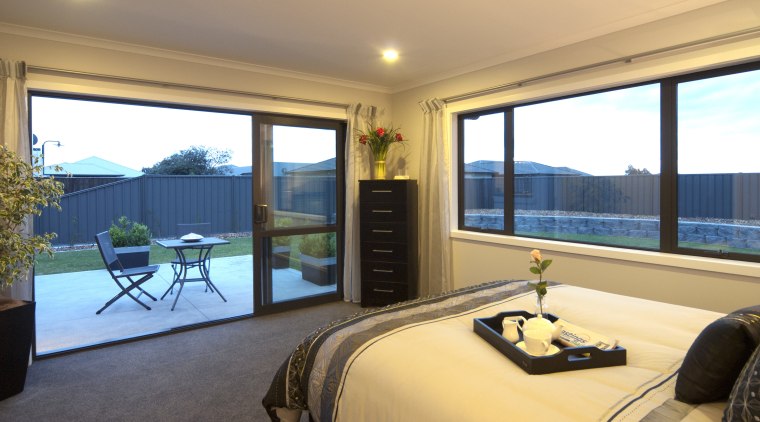 View of master bedroom of this David Reid estate, home, house, interior design, property, real estate, room, window, orange