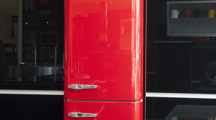 View of kitchen which features a Smeg 50s red, refrigerator, black, red