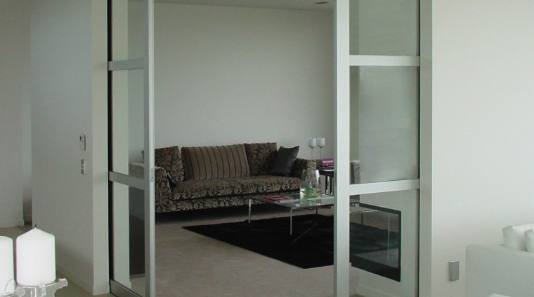 Interior view of an apartment which features a architecture, door, floor, glass, house, interior design, window, gray