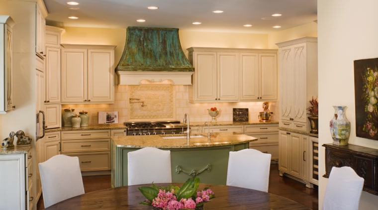 View of a kitchen and dining area with cabinetry, countertop, cuisine classique, home, interior design, kitchen, living room, room, orange, brown, gray