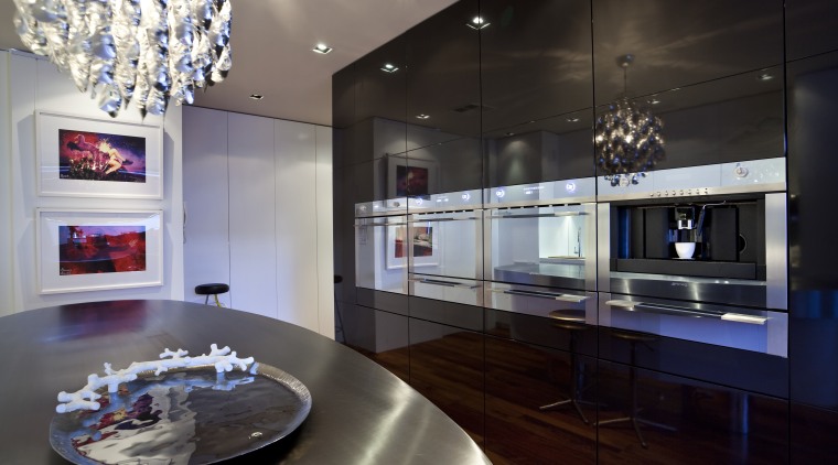 View of a kitchen which features an oval-shaped countertop, interior design, kitchen, room, black, gray