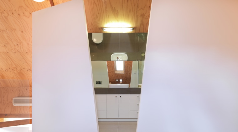 View of bathroom suite with angled openings - architecture, ceiling, daylighting, floor, home, house, interior design, property, real estate, room, wall, wood, white, orange