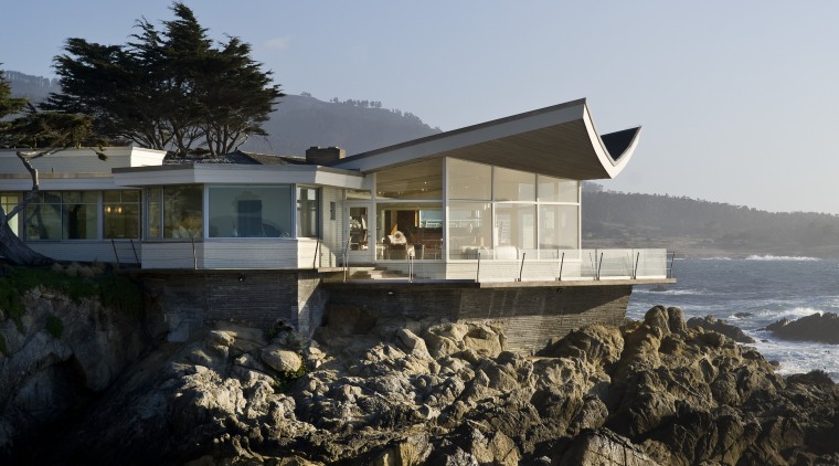 View of the oceanfront Butterfly House in Carmel architecture, building, cottage, home, house, property, real estate, reflection, sky, water, black, gray