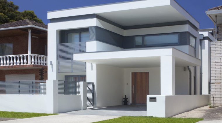 View of contemporary white home. - View of architecture, building, elevation, estate, facade, home, house, official residence, property, real estate, residential area, gray