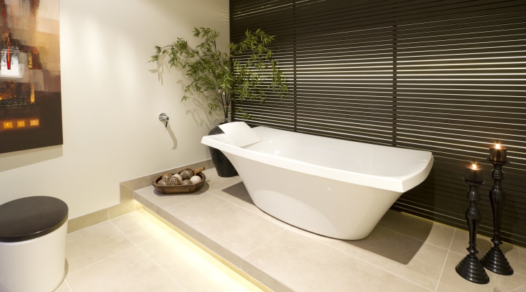 View of a David Reid Homes house with bathroom, bathtub, floor, interior design, plumbing fixture, product design, room, tile, orange, brown