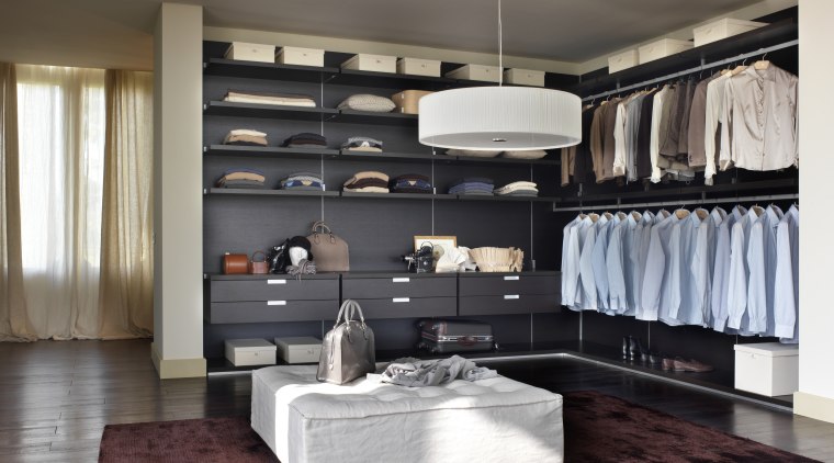 View of wardrobe and storage. - View of furniture, interior design, living room, room, gray, black