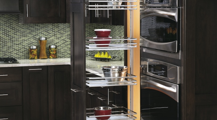 View of kitchen organisation products by Rev-A-Shelf, including cabinetry, closet, countertop, display case, furniture, kitchen, kitchen appliance, refrigerator, shelf, shelving, black