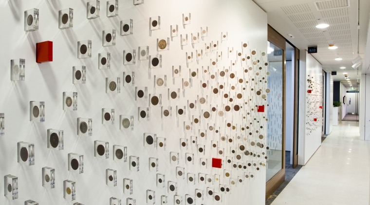 A heritage coin collection is encased in custom-designed ceiling, design, exhibition, interior design, wall, gray
