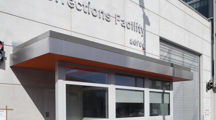 View of windows at Mt Eden prison by architecture, building, commercial building, facade, white