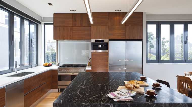 Designer Shane George. Open-plan space. Small amount of cabinetry, countertop, cuisine classique, interior design, kitchen, living room, window, white