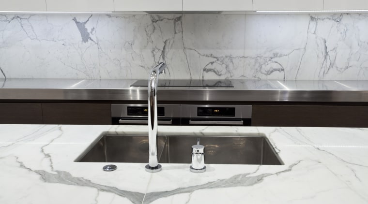 Designed by Morgan Cronin of Cronin Kitchens, this bathroom sink, countertop, floor, furniture, interior design, kitchen, product design, sink, table, tap, tile, white, gray