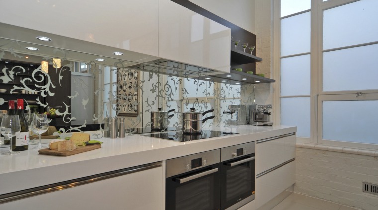 Upmarket kitchen. Designer Sandra Banks. CaesarStone Snow Qaurtz countertop, cuisine classique, interior design, kitchen, property, gray