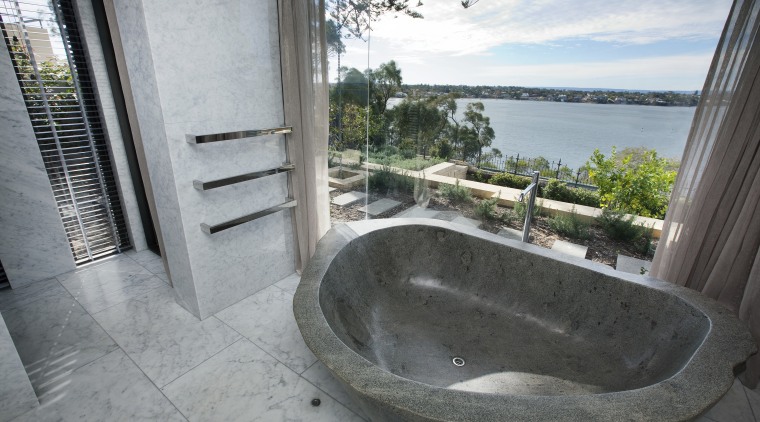 This master suite in a contemporary new house bathtub, estate, property, real estate, gray