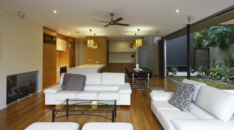 This house was designed by Kon Panagopoulos and ceiling, estate, home, house, interior design, living room, property, real estate, room, brown