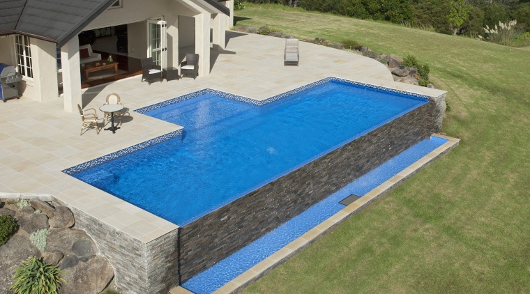 This is a view of the pool designed backyard, house, leisure, property, real estate, swimming pool, yard, brown, gray