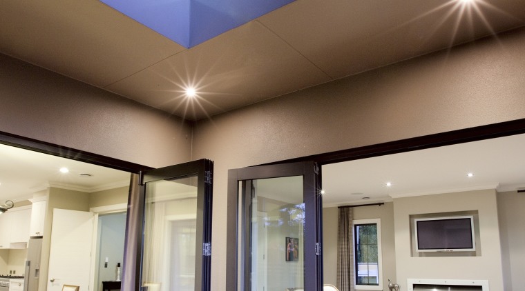 This house was designed and built by Landmark architecture, ceiling, daylighting, estate, home, house, interior design, lobby, real estate, wall, window, brown