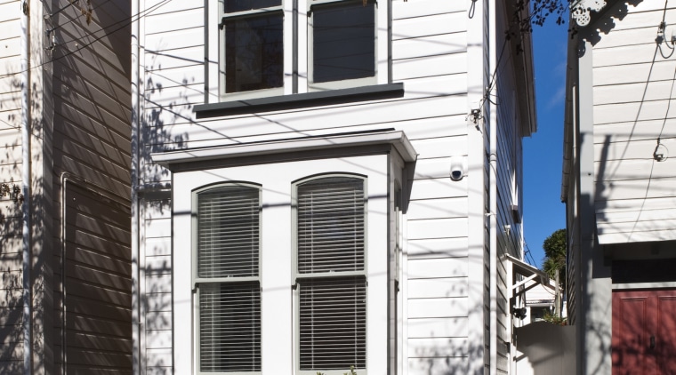 This home was renovated by Tse:Wallace Architects. Here architecture, building, cottage, facade, historic house, home, house, neighbourhood, property, real estate, residential area, siding, town, wall, window, gray