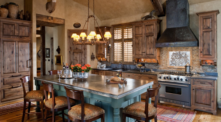 The interior of this home was designed by cabinetry, countertop, cuisine classique, interior design, kitchen, room, brown