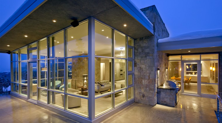 The interior of this home was designed by architecture, estate, home, house, interior design, lighting, real estate, window, blue, brown