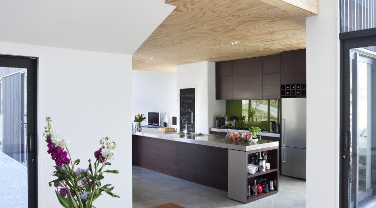 View of home renovated with the help of architecture, countertop, daylighting, floor, home, house, interior design, kitchen, living room, real estate, white