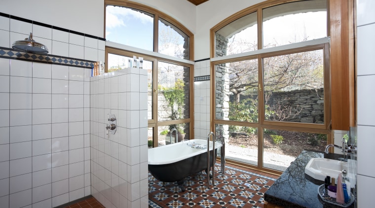 Bathroom with floor mat, free standing pub and bathroom, daylighting, estate, home, house, property, real estate, room, window, gray, white