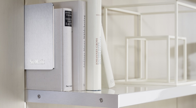 Photography of the "FloatingSpaces" system by SieMatic. furniture, product, product design, shelf, shelving, gray