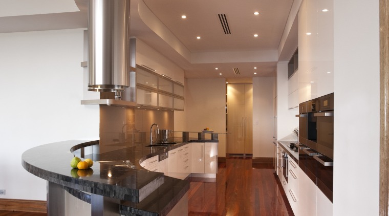 View of contemporary kitchen with wooden flooring and cabinetry, ceiling, countertop, floor, flooring, hardwood, interior design, kitchen, laminate flooring, real estate, room, wood flooring, red, gray